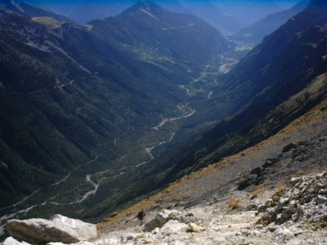 and the valley below, which we were to reach that day.<br />(The guy climbing turned out to be from Glasgow :-)